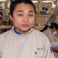 Chen Hong is a worker at a Chinese factory that makes furniture for the U.S.