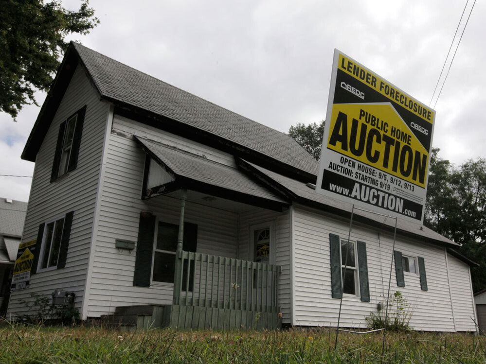 A foreclosed home in Owosso, Mich.  Paul Sancya/AP