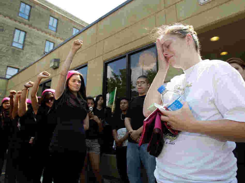 Crystal Dillman, the fiancee of Luis Ramirez, is moved to tears outside the courthouse.