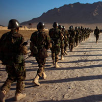 Afghan army recruits march as part of their daily training.