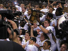 The 2009 Abilene High School Eagles hold their championship trophy. The 2009 Abilene High School Eagles hold their championship trophy.