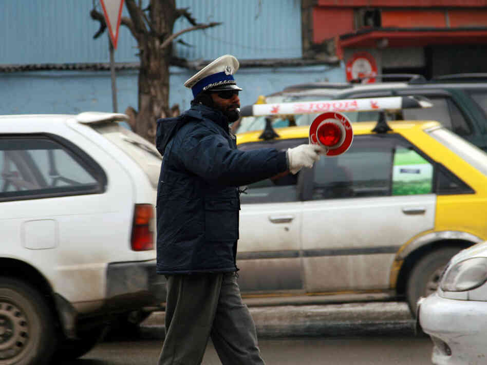 This traffic officer in Kabul named Saboor, is renowned as the "honest" cop.