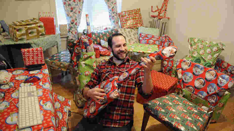 Adal Rifai sits in his friend Louie Saunders' apartment in Chicago.