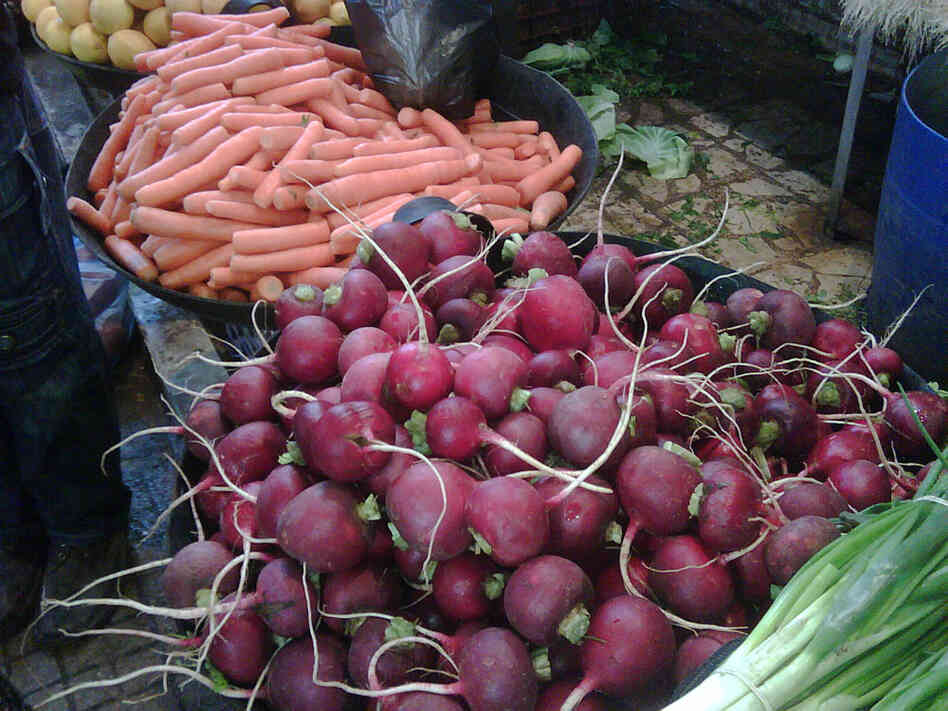 The markets of Aleppo brim with fresh vegetables and spices.