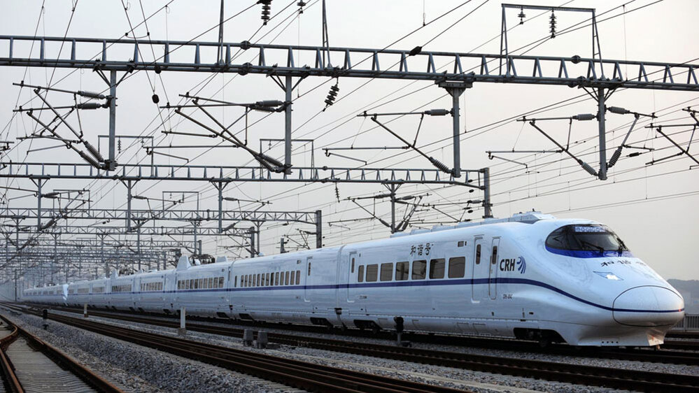 WIDE: The high-speed train travels through Wuhan city in central China. Shi wei/AP WIDE: The high-speed train travels through Wuhan city in central China. Shi wei/AP