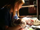 Tracy Wergley Graebener checks vital signs on a baby girl. Tracy Wergley Graebener checks vital signs on a baby girl.
