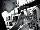 A technician checks a networking cable. A technician checks a networking cable.