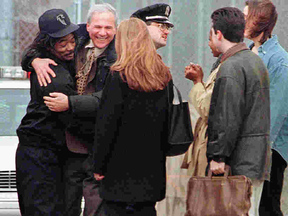 David Protess (right) and Anthony Porter  embrace outside the Cook County Jail in Chicago.