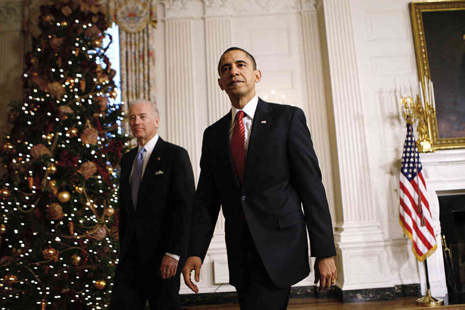 President Obama and Vice President Biden leave the White House dining room on Dec. 24.