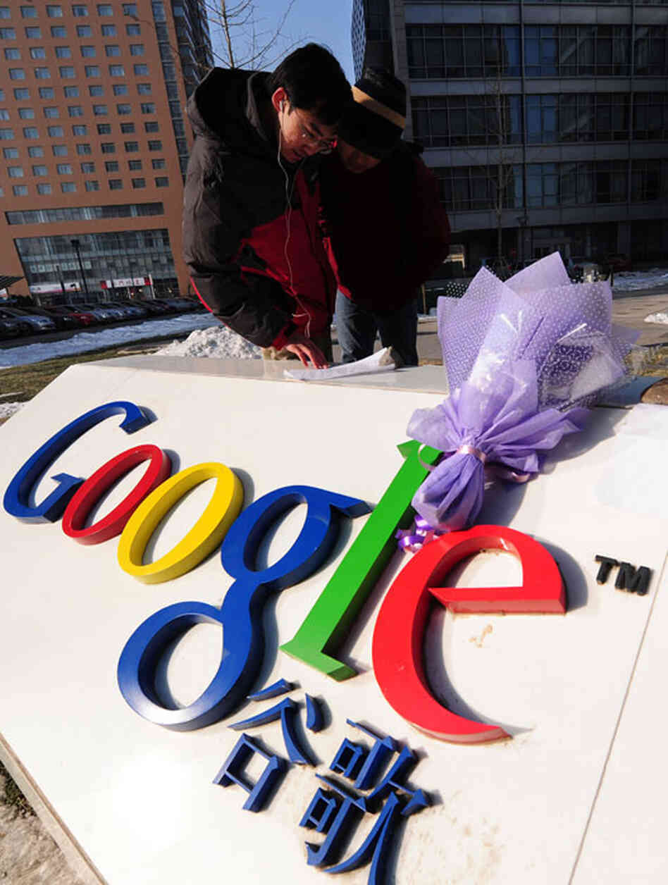 A bouquet of flowers lies upon the Google logo outside the company's Beijing headquarters.
