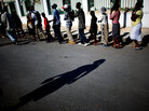 Haitians wait in line for rations from the United Nations World Food Program Haitians wait in line for rations from the United Nations World Food Program