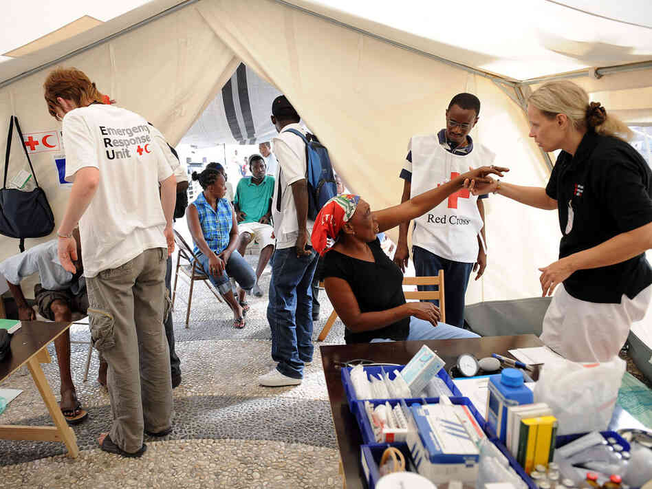 Patients are treated at a Finnish Red Cross tent in Port-au-Prince on January 26, 2010.