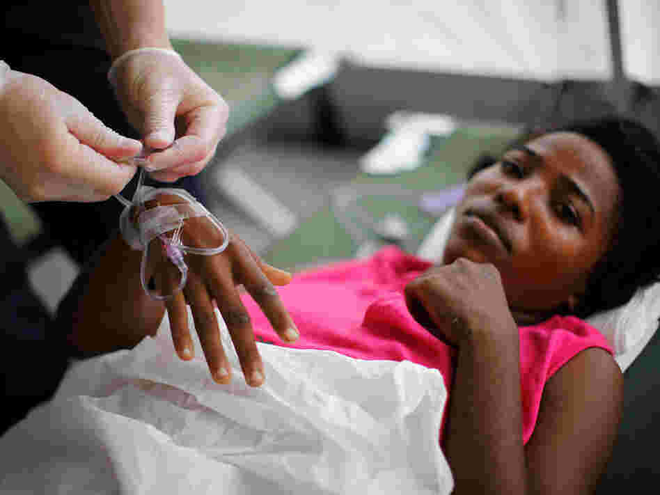 A patient in Haiti gets treatment.