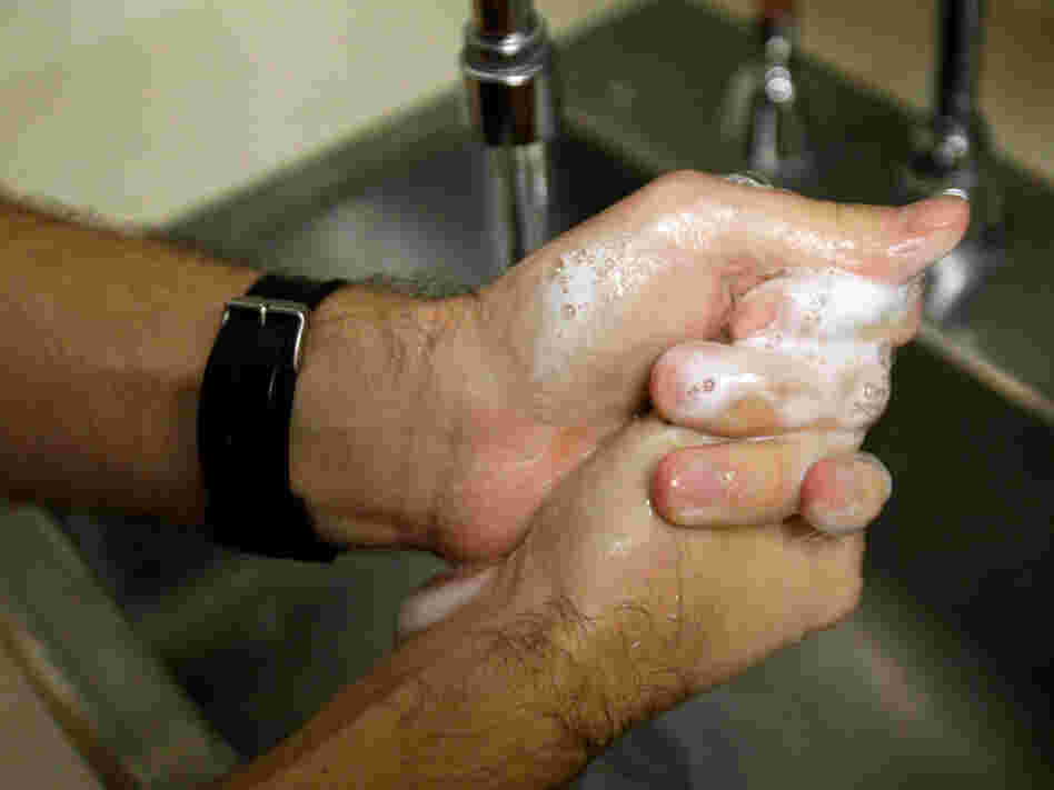 Washing hands. Rob Carr/AP
