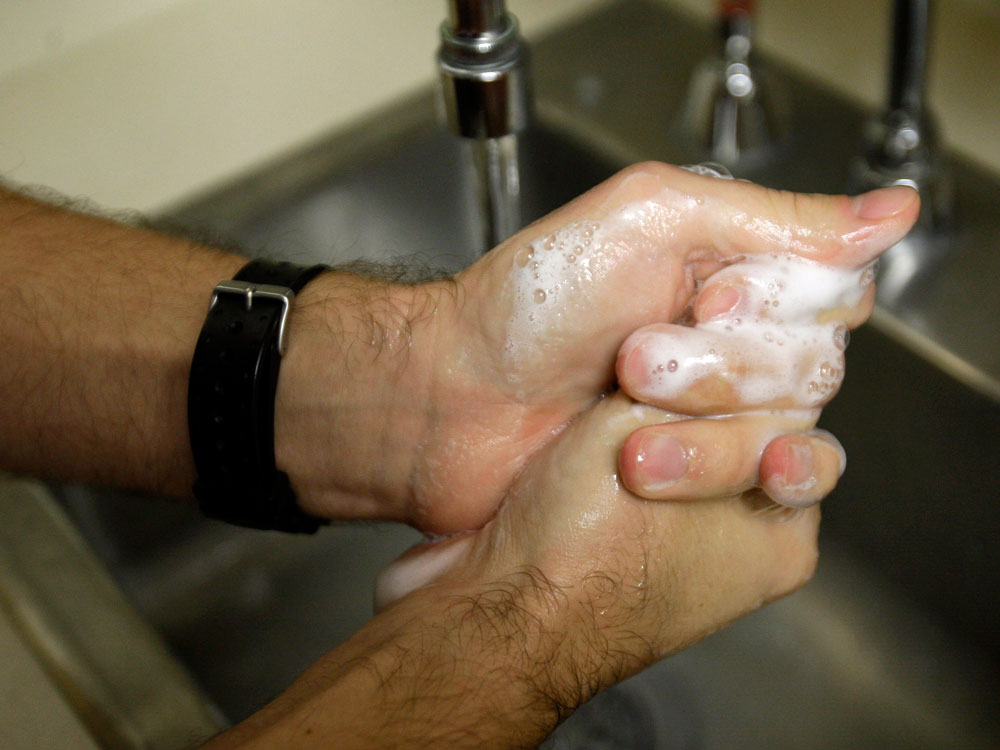 Washing hands. Rob Carr/AP