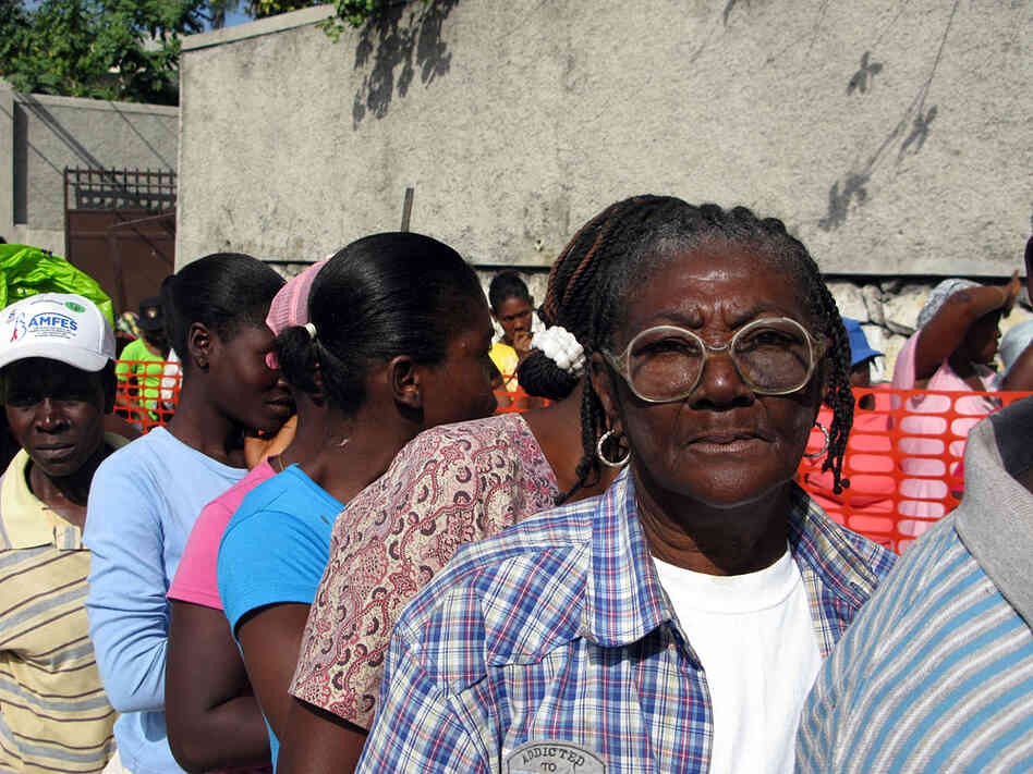 Therese Nozile, 66, waits in line for food in Port-au-Prince, Haiti, on Sunday.