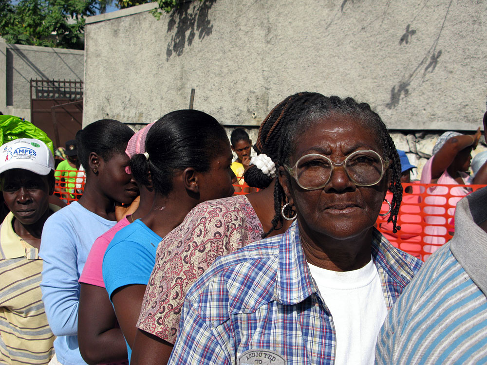 Therese Nozile, 66, waits in line for food in Port-au-Prince, Haiti, on Sunday.