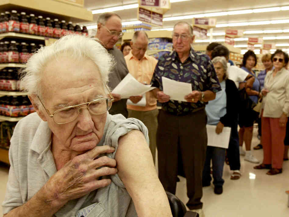 Pete Jacksen, 86, waits in line to get a flu shot at Pavilions pharmacy in Monrovia, Calif. Pete Jacksen, 86, waits in line to get a flu shot at Pavilions pharmacy in Monrovia, Calif.