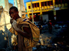 Looting continues in downtown Port-au-Prince. Looting continues in downtown Port-au-Prince.