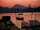 Sun sets over the Mekong River in Luang Prabang, Laos Sun sets over the Mekong River in Luang Prabang, Laos