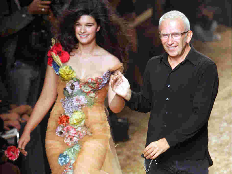 French fashion designer Jean-Paul Gaultier takes the catwalk with plus-size model Crystal Renn. French fashion designer Jean-Paul Gaultier takes the catwalk with plus-size model Crystal Renn.