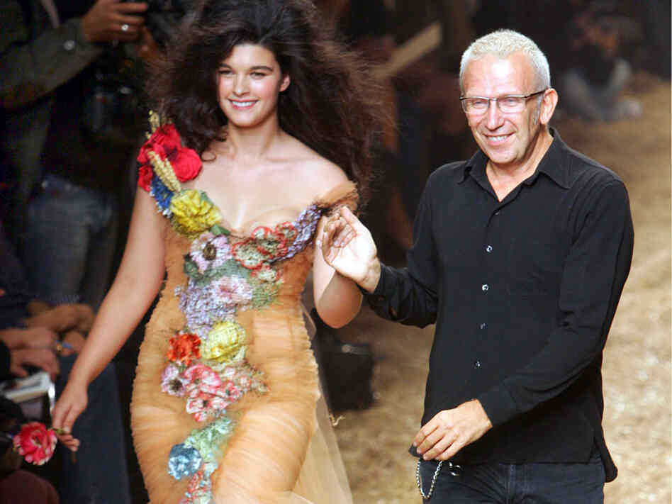 French fashion designer Jean-Paul Gaultier takes the catwalk with plus-size model Crystal Renn. French fashion designer Jean-Paul Gaultier takes the catwalk with plus-size model Crystal Renn.