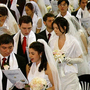 Couples from around the world participate in a mass wedding ceremony in Goyang, South Korea. Couples from around the world participate in a mass wedding ceremony in Goyang, South Korea.