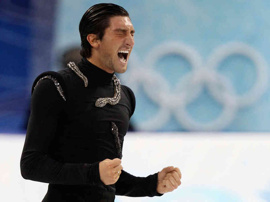 Evan Lysacek reacts after performing his free program during men's figure skating.