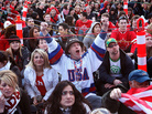 American Paul Turek watches the USA hockey game against Canada in Vancouver. American Paul Turek watches the USA hockey game against Canada in Vancouver.