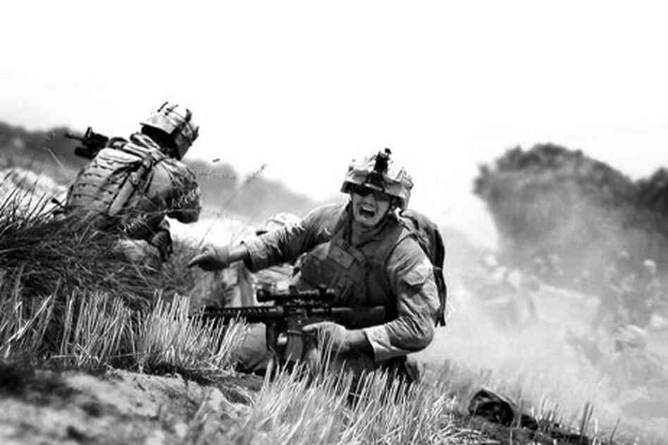 A Marine yells for help while under heavy fire from a machine gun in the Helmand River Valley in Hel A Marine yells for help while under heavy fire from a machine gun in the Helmand River Valley in Hel