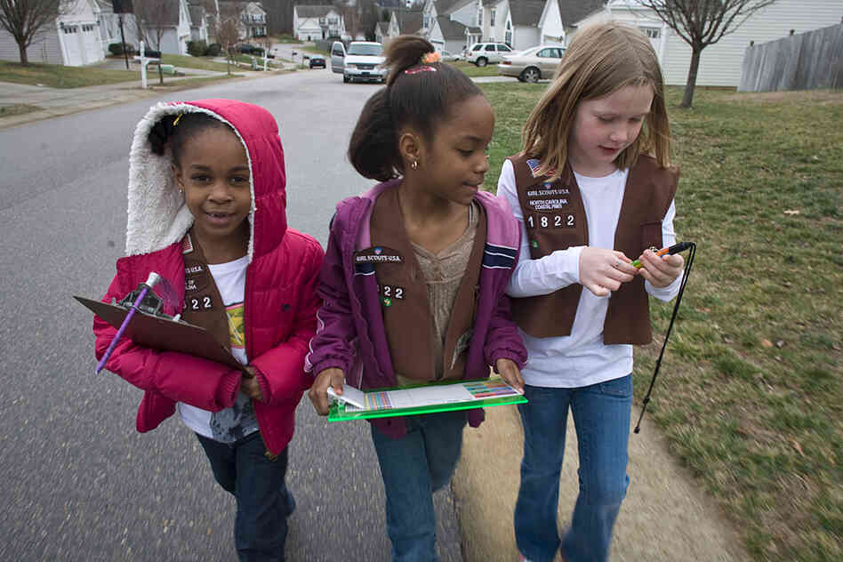 Girls Scouts canvass a north Raleigh neighborhood selling cookies in late January.