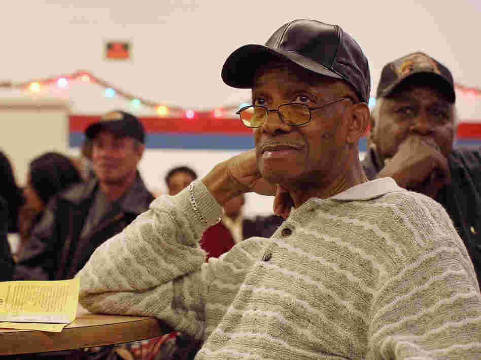 Retired members of the United Auto Workers attend a benefits meeting.