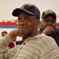 Retired members of the United Auto Workers attend a benefits meeting.