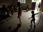 Children play at a school that has been converted into a shelter for quake victims Children play at a school that has been converted into a shelter for quake victims