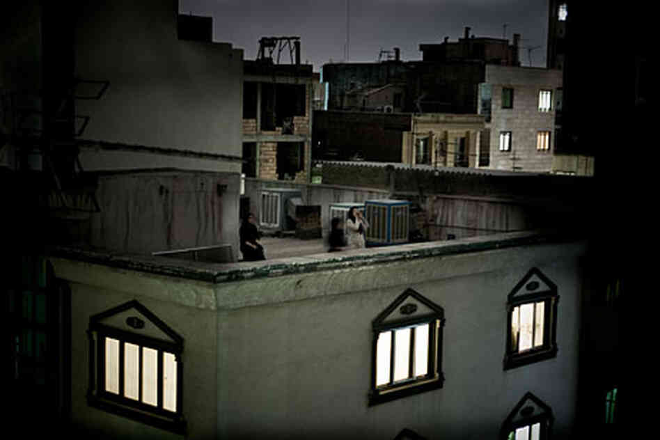 Women shout on a rooftop in protest to the presidential election results, Tehran, Iran, 24 June (Pi Women shout on a rooftop in protest to the presidential election results, Tehran, Iran, 24 June (Pi
