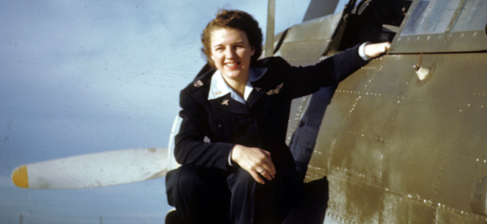 Lillian Yonally on the wing of a Douglass Daughtless during her service as a WASP.