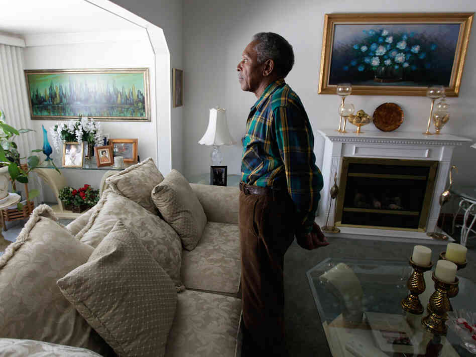 Otis McDonald glances out the window in his home on Chicago's South Side.