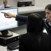 MIT Sloan Fellows participate in a stock market class.