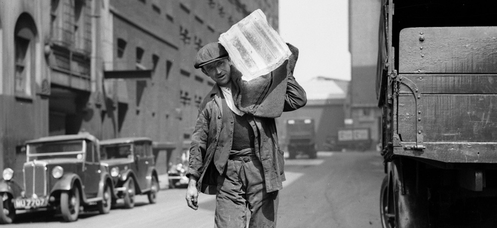 A workman delivers ice in 1936.