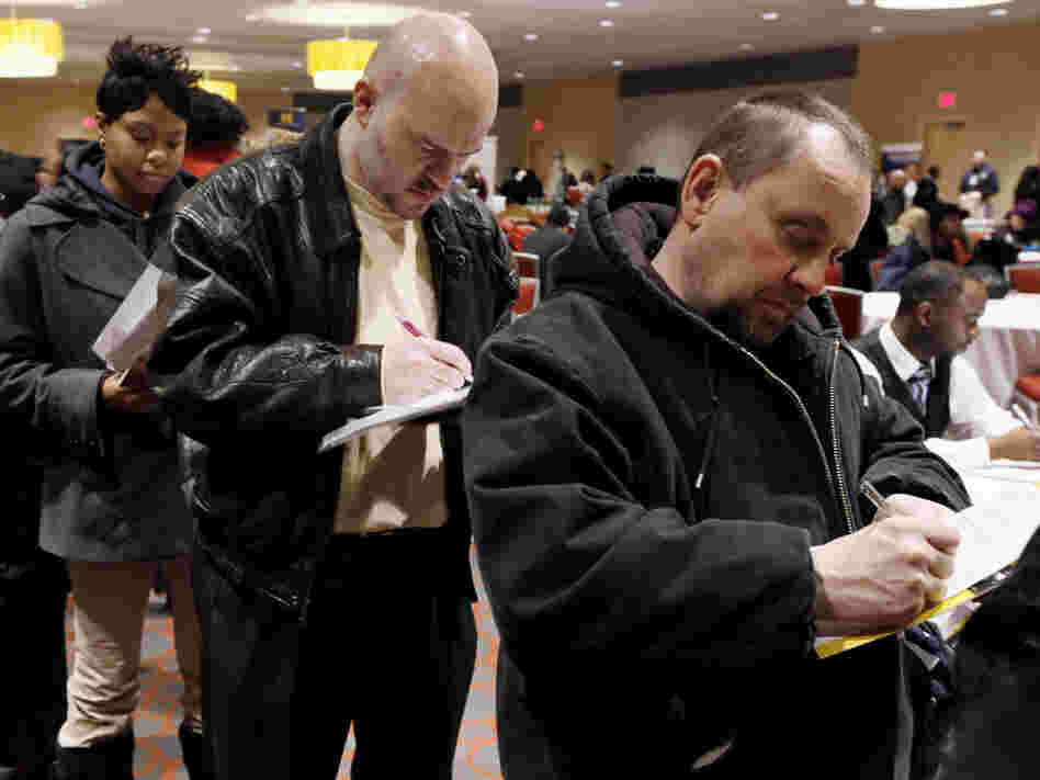 Detroit job seekers attend an employment fair.