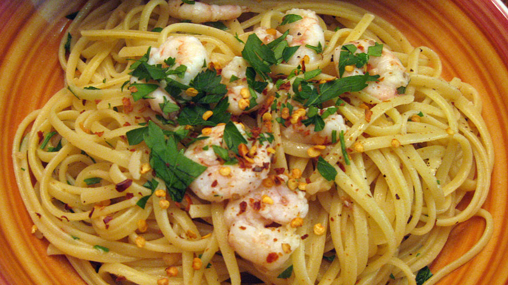 Linguine with garlic and red pepper flakes are tossed with fresh Maine shrimp in a simple, memorable dish from food writer Jessica Strelitz's childhood.