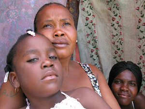 Marie Claudine Macena and her daughters, residents of Petionville Club camp Marie Claudine Macena and her daughters, residents of Petionville Club camp