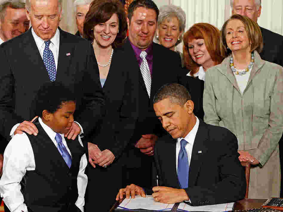 President Obama signs the Affordable Health Care for America Act