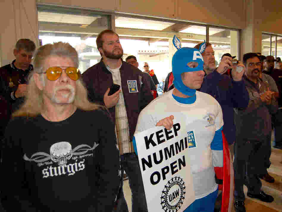 Workers and family members turned out for a rally to keep the plant open.
