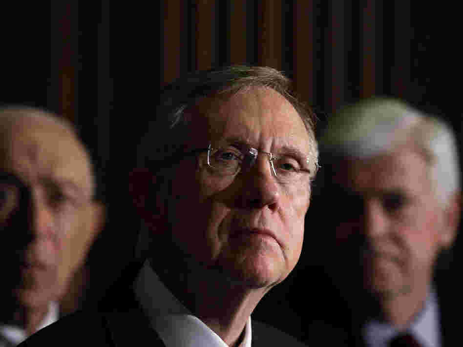Senate Democratic leaders Frank Lautenberg, Harry Reid and Christopher Dodd