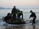 South Korean marines return to a beach on Baengnyeong Island South Korean marines return to a beach on Baengnyeong Island