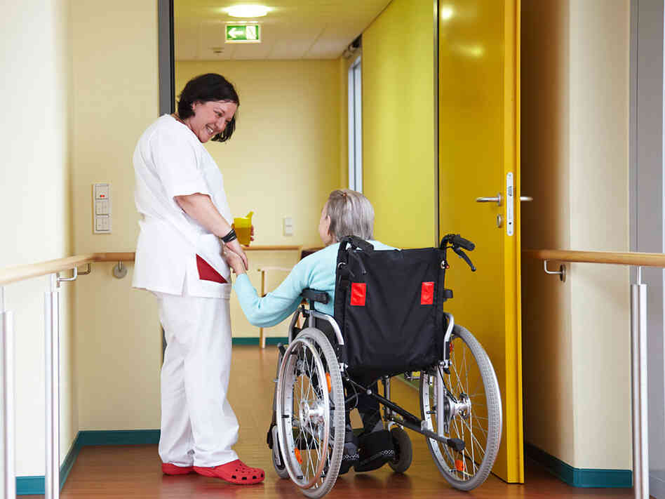 A patient and nurse in a nursing home