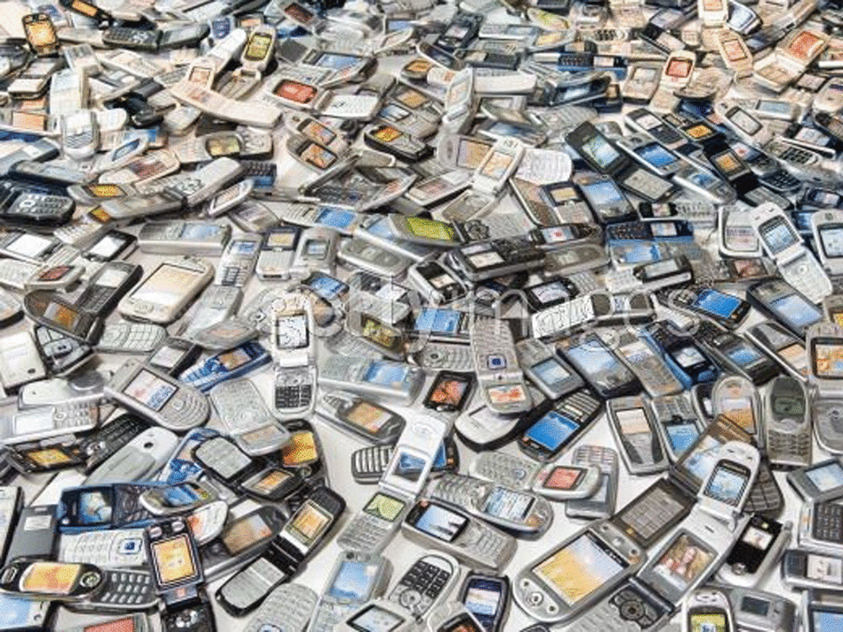 A pile of old cell phones. The EPA urges cell phones be recycled. A pile of old cell phones. The EPA urges cell phones be recycled.