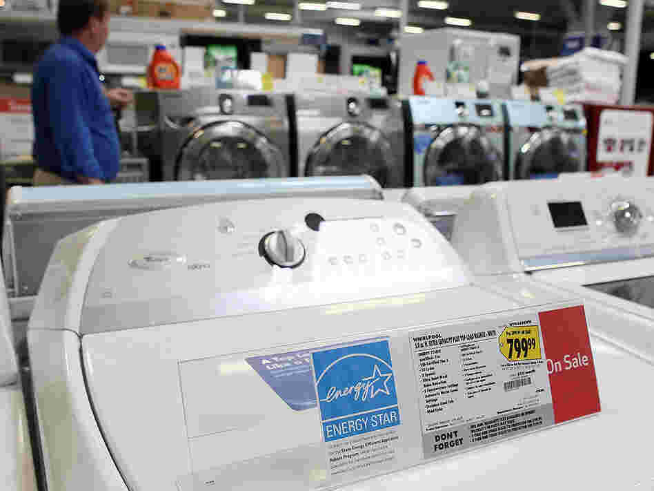 An Energy Star label is displayed on a washing machine at a Best Buy store.