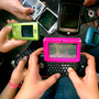 Granite Elementary School sixth grade students hold up their cell phones in Sandy, Utah.